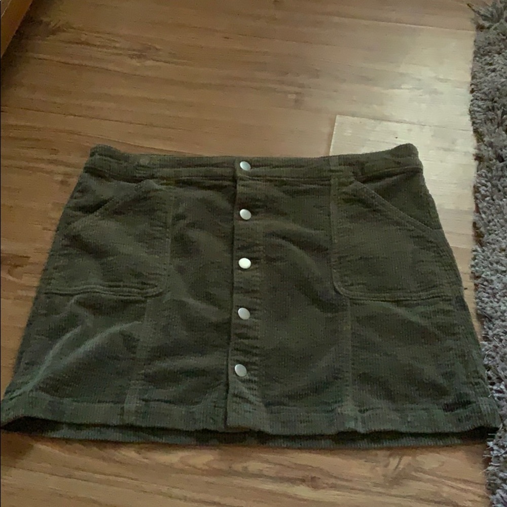 Green mini skirt